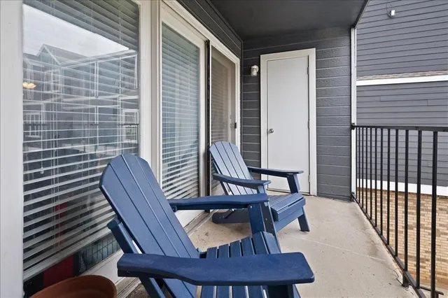 a view of a swimming pool with a lounge chairs