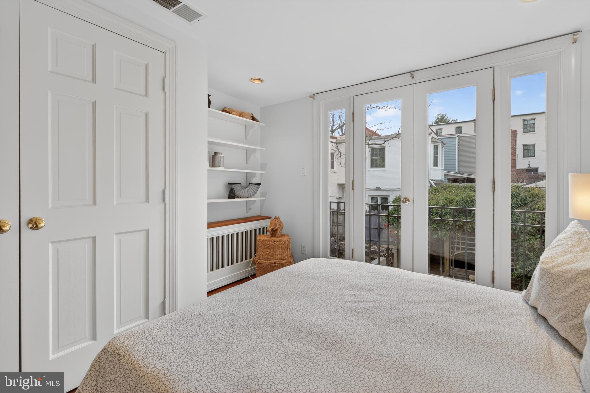 1610 33rd Street Northwest Washington, DC 20007 - Photo 10 of 25 Doors and built-ins in master