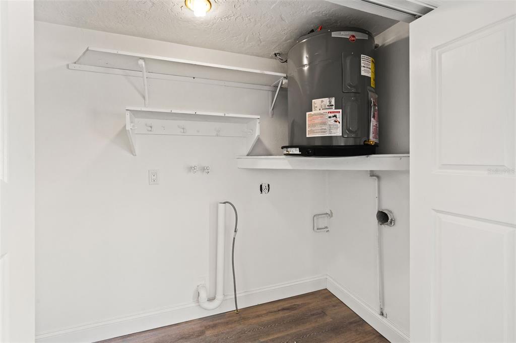 4127 Stratford Drive, Unit 4127 New Port Richey, FL 34652 - Photo 30 of 45 a view of an entryway with wooden floor