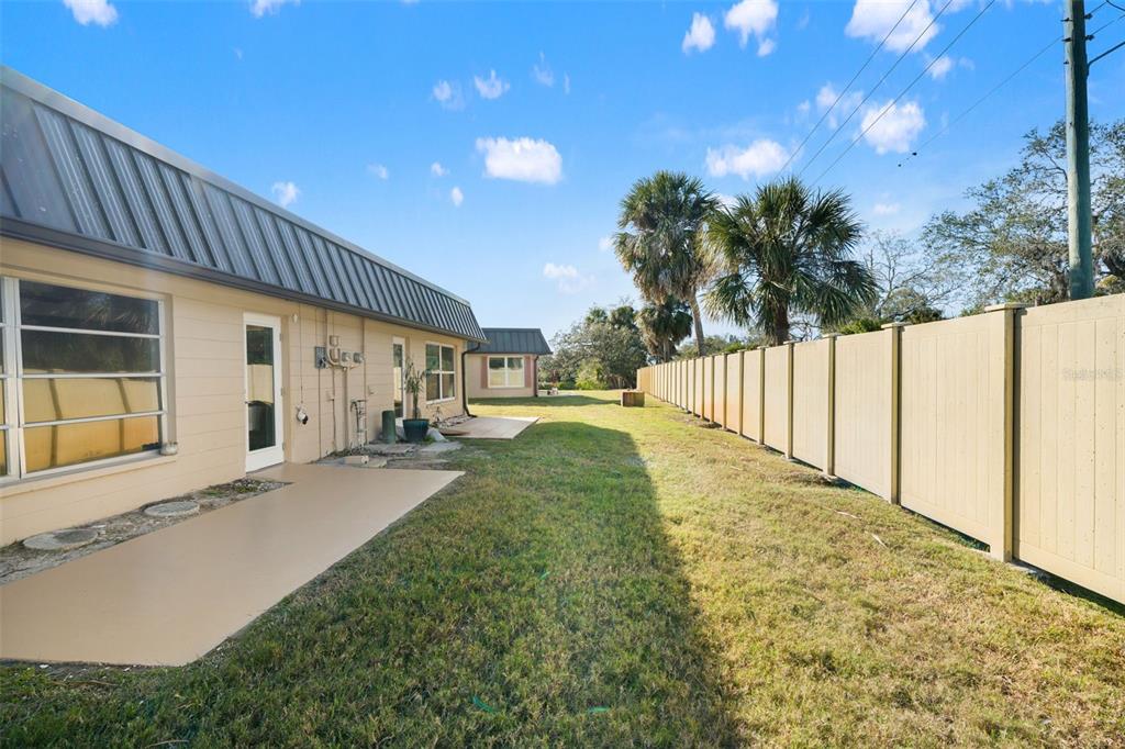 4127 Stratford Drive, Unit 4127 New Port Richey, FL 34652 - Photo 34 of 45 a view of backyard of the house