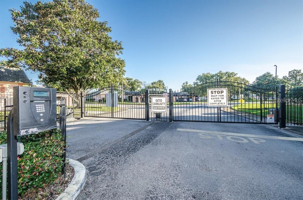 4127 Stratford Drive, Unit 4127 New Port Richey, FL 34652 - Photo 39 of 45 a view of a garden from a patio