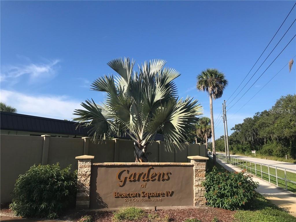 4127 Stratford Drive, Unit 4127 New Port Richey, FL 34652 - Photo 45 of 45 a view of a street with a building in the background
