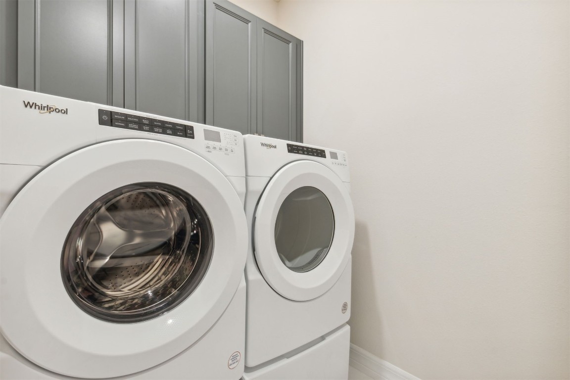 840 Continuum Loop Yulee, FL 32097 - Photo 42 of 64 a utility room with dryer and washer