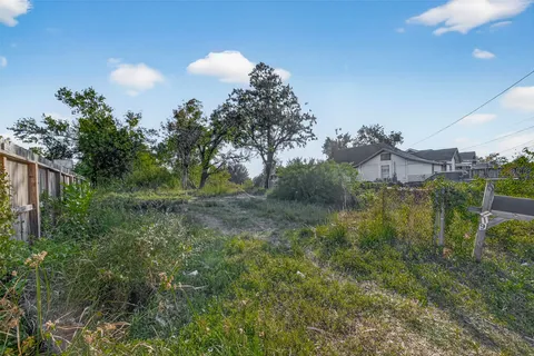 a view of a lake and green space