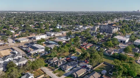 an aerial view of a city with lots of residential buildings