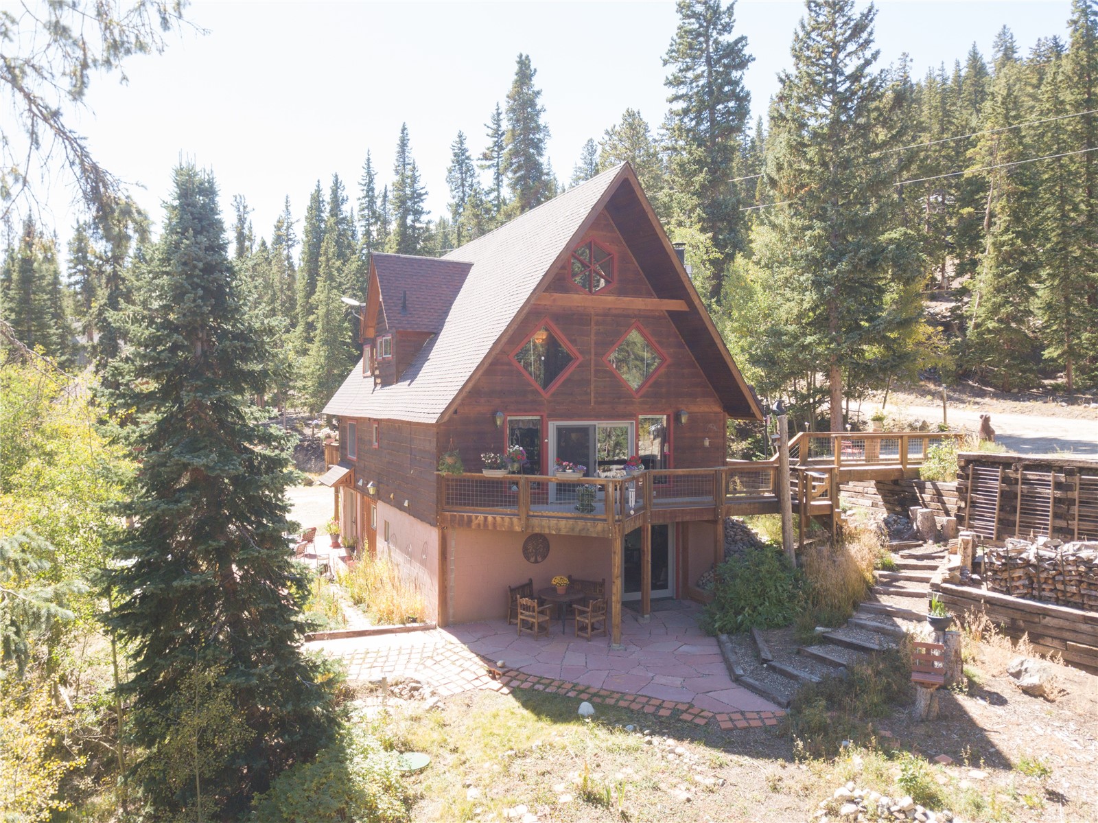 242 Ridge Road Alma, CO 80420 - Photo 31 of 35 When the snow melts, you'll enjoy multiple outdoor living spaces, decks and flower beds!