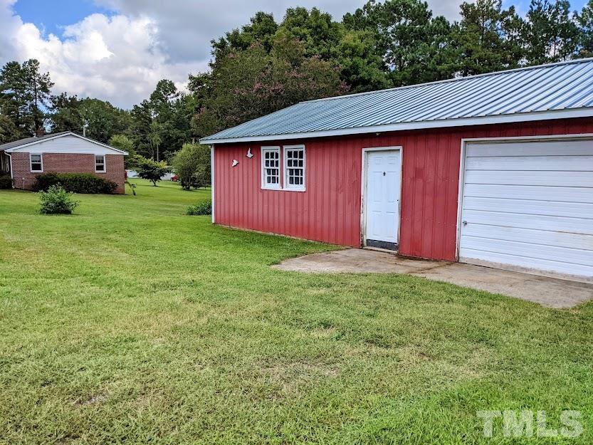 362 Tinker Road Chase City, VA 23924 - Photo 2 of 21 a view of a barn in the middle of a yard