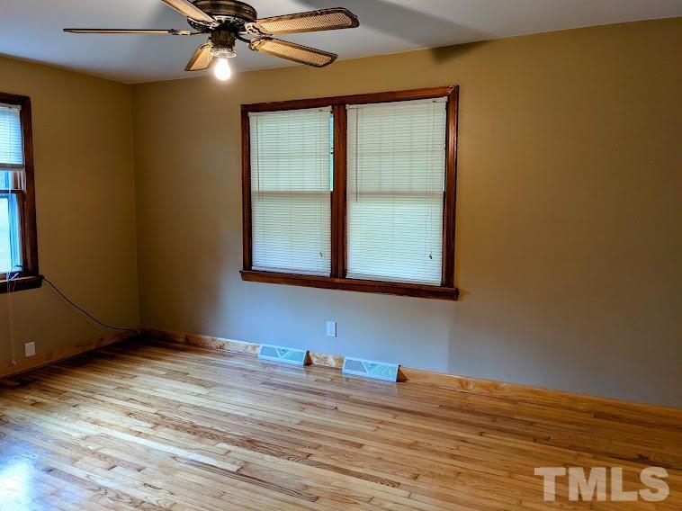 362 Tinker Road Chase City, VA 23924 - Photo 11 of 21 a view of a room that has a window and wooden floor