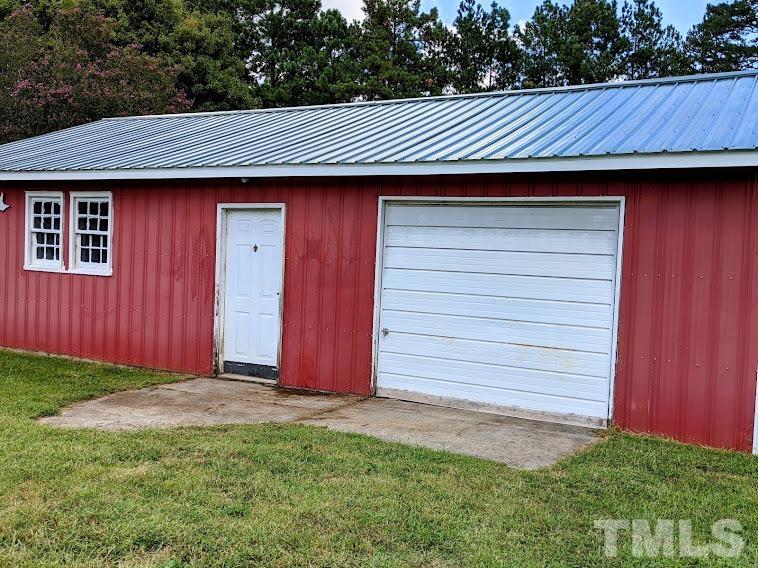 362 Tinker Road Chase City, VA 23924 - Photo 16 of 21 a front view of a house with a garden