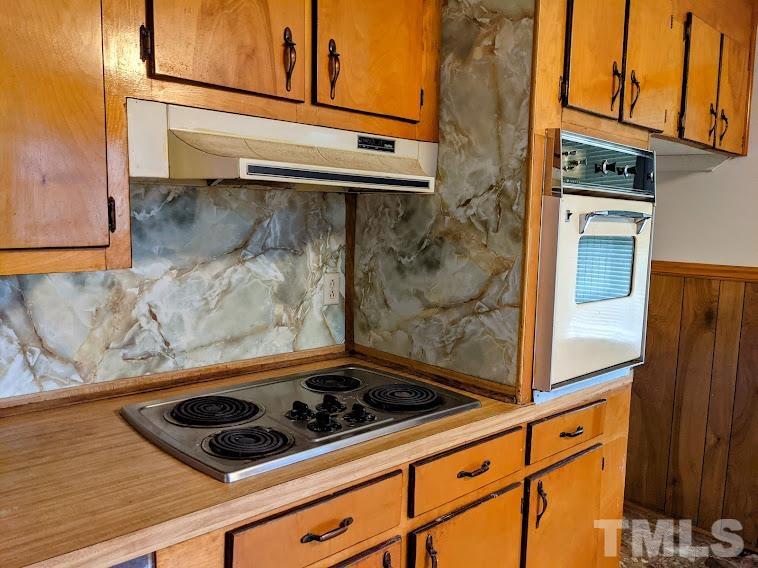 362 Tinker Road Chase City, VA 23924 - Photo 7 of 21 a close view of a stove top oven sitting inside of a kitchen