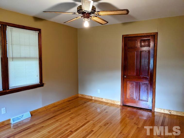 362 Tinker Road Chase City, VA 23924 - Photo 10 of 21 a view of empty room with wooden floor