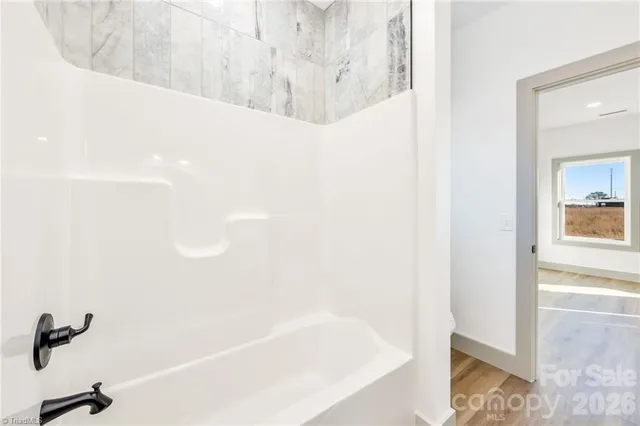 a bathroom with a bathtub