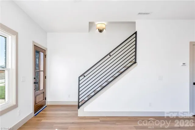 a view of a hallway with entryway