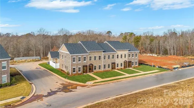 a view of a city with tall buildings