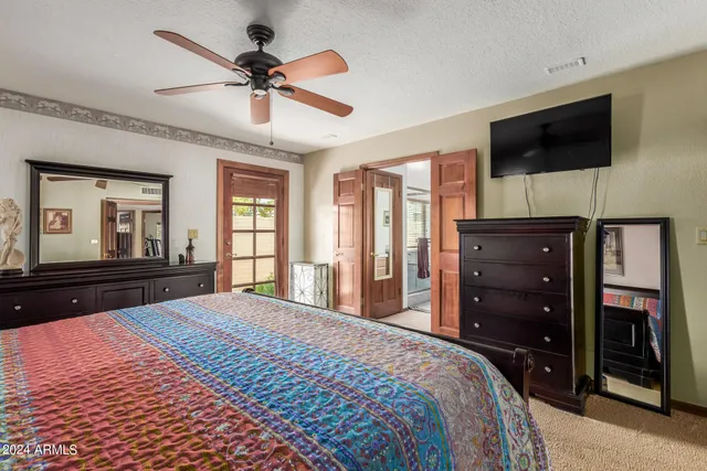 a bedroom with a bed and closet