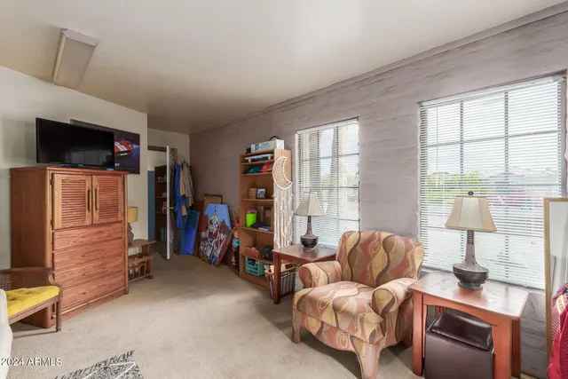 a kitchen with a sink cabinets and a stove top oven