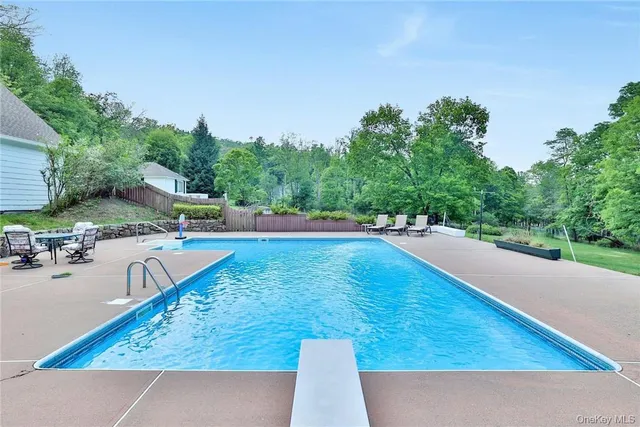 a view of a park with large trees