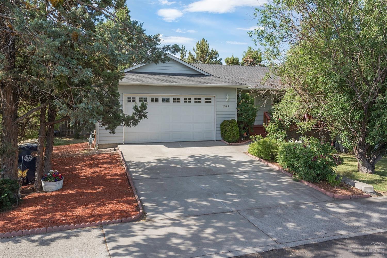 2368 Northeast Wells Acres Road Bend, OR 97701 - Photo 1 of 25 Shady front with mature landscaping.