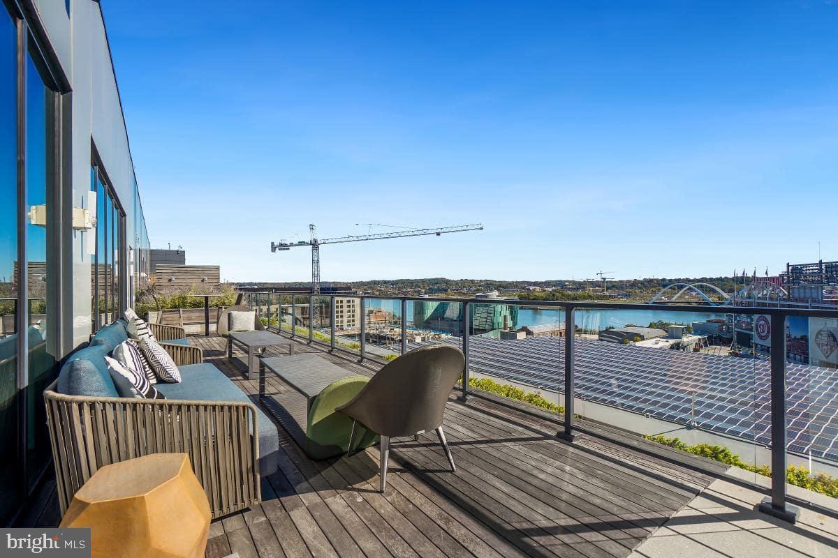 70 N Street Southeast, Unit N1016 Washington, DC 20003 - Photo 15 of 21 a view of a balcony with wooden floor
