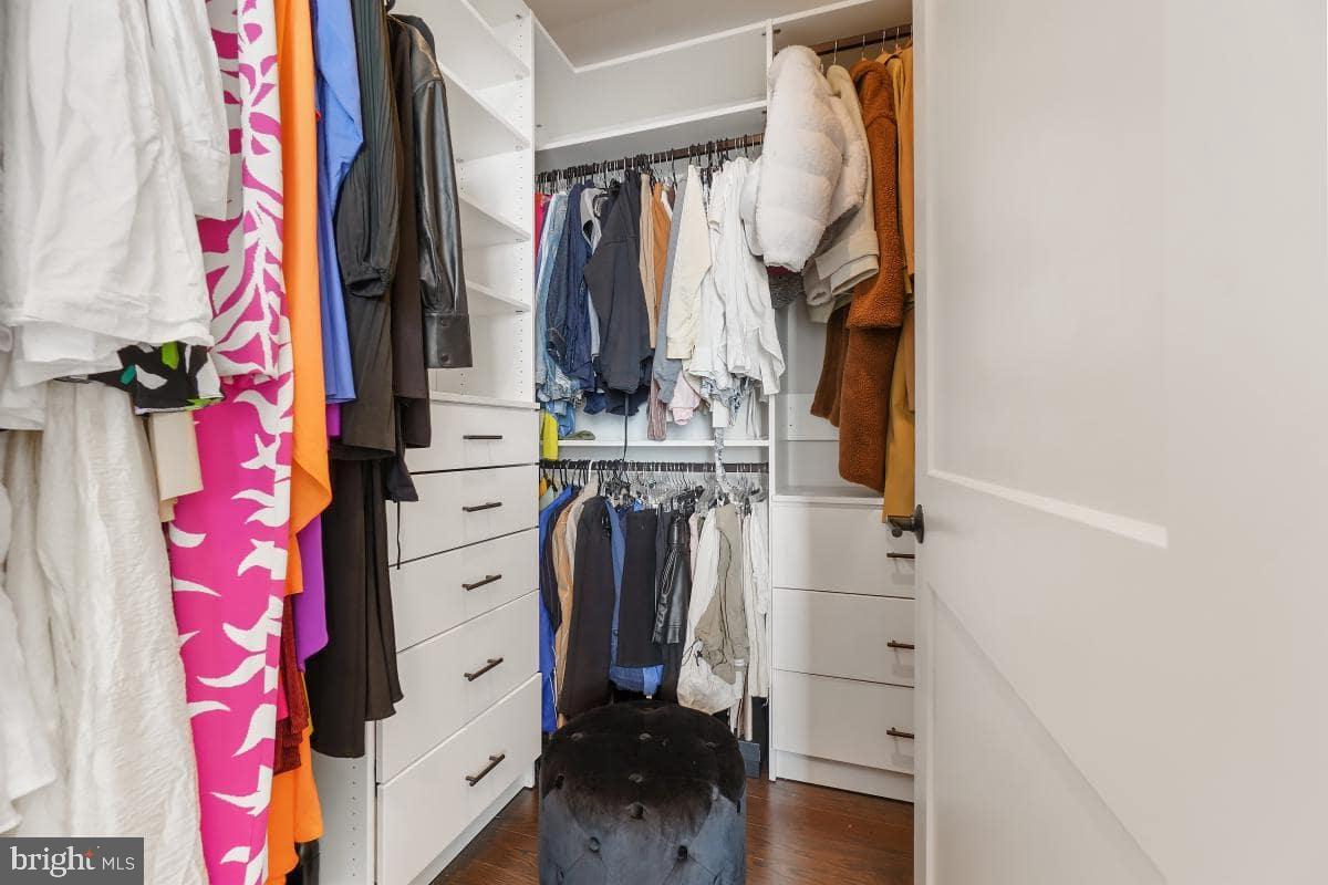 70 N Street Southeast, Unit N1016 Washington, DC 20003 - Photo 6 of 21 a view of walk in closet with clothes