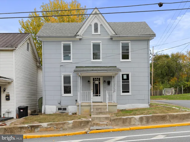 a view of a house with a swimming pool