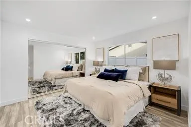 a bathroom with a sink mirror toilet and bathtub
