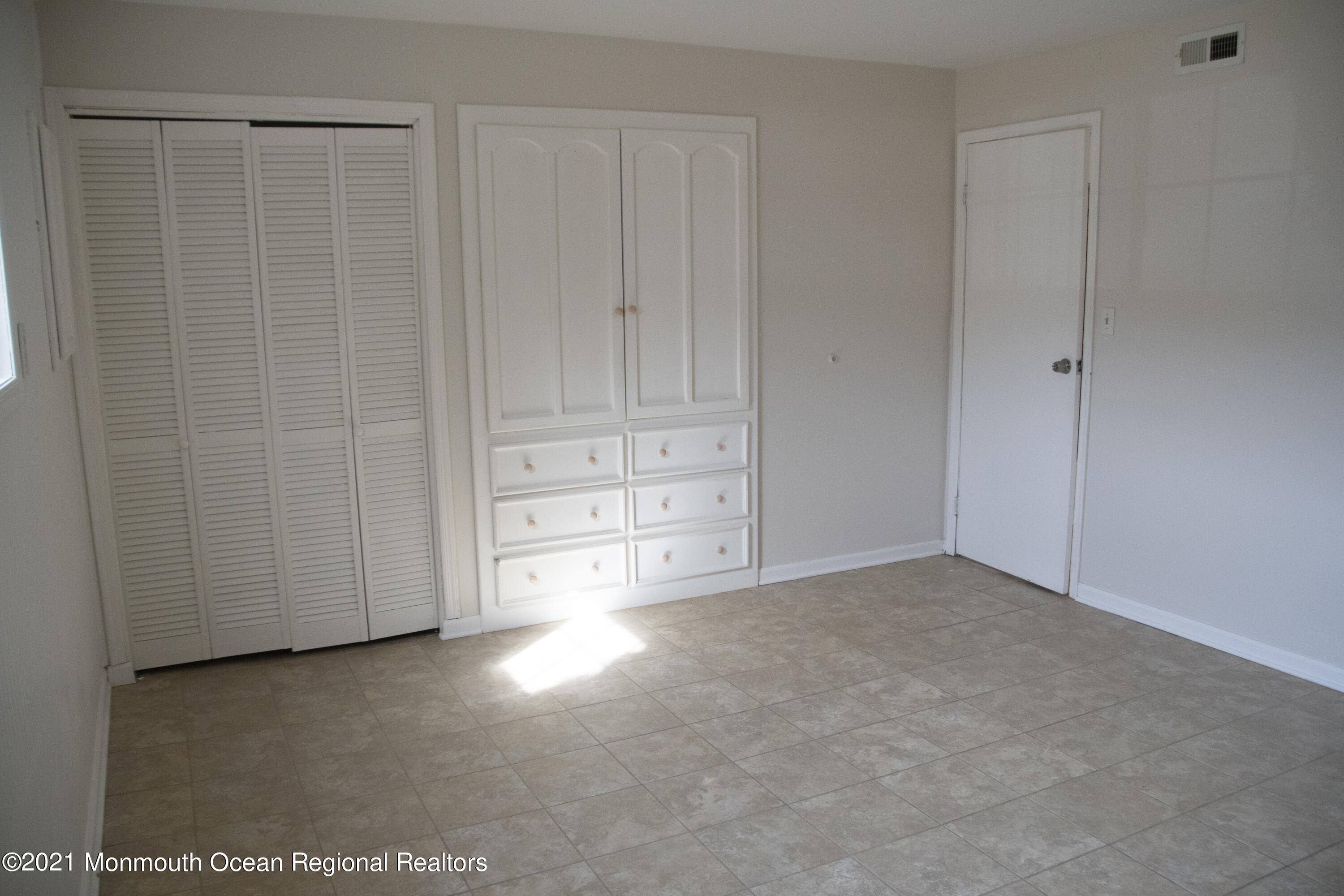 326 Sawmill Road, Unit 132 Brick, NJ 08724 - Photo 15 of 18 a view of an empty room with closet
