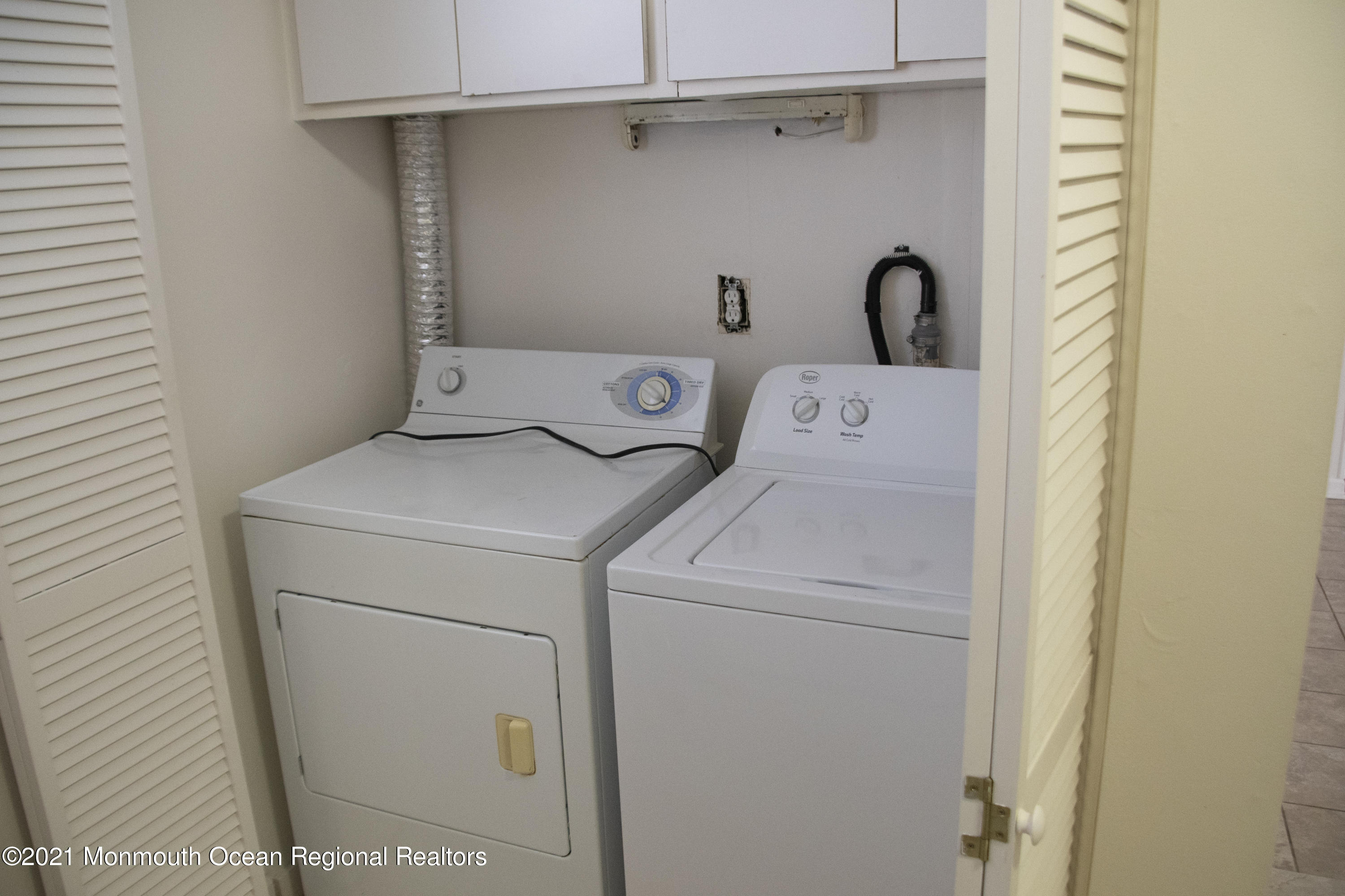 326 Sawmill Road, Unit 132 Brick, NJ 08724 - Photo 16 of 18 a utility room with dryer and washer