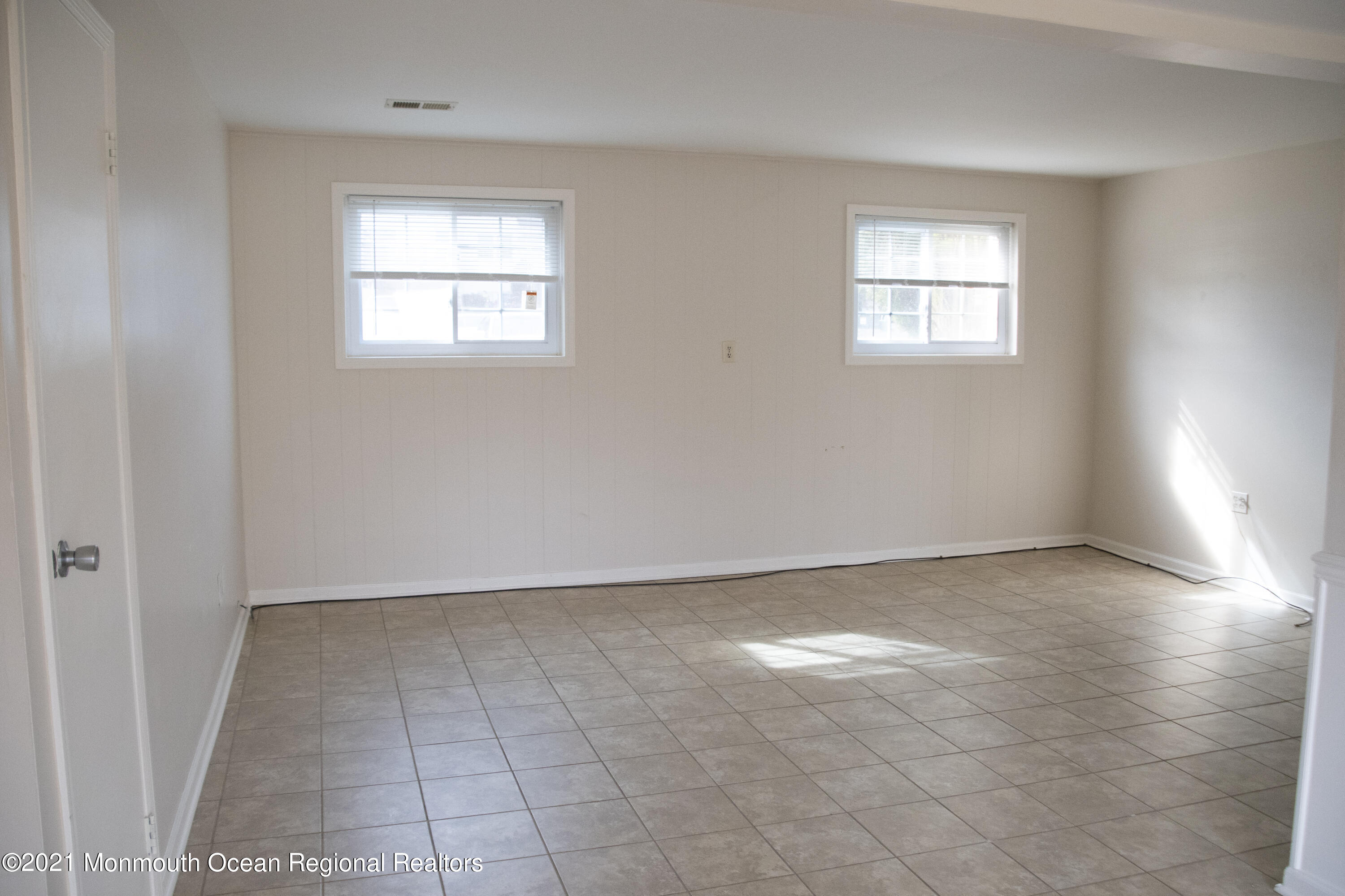326 Sawmill Road, Unit 132 Brick, NJ 08724 - Photo 6 of 18 an empty room with windows