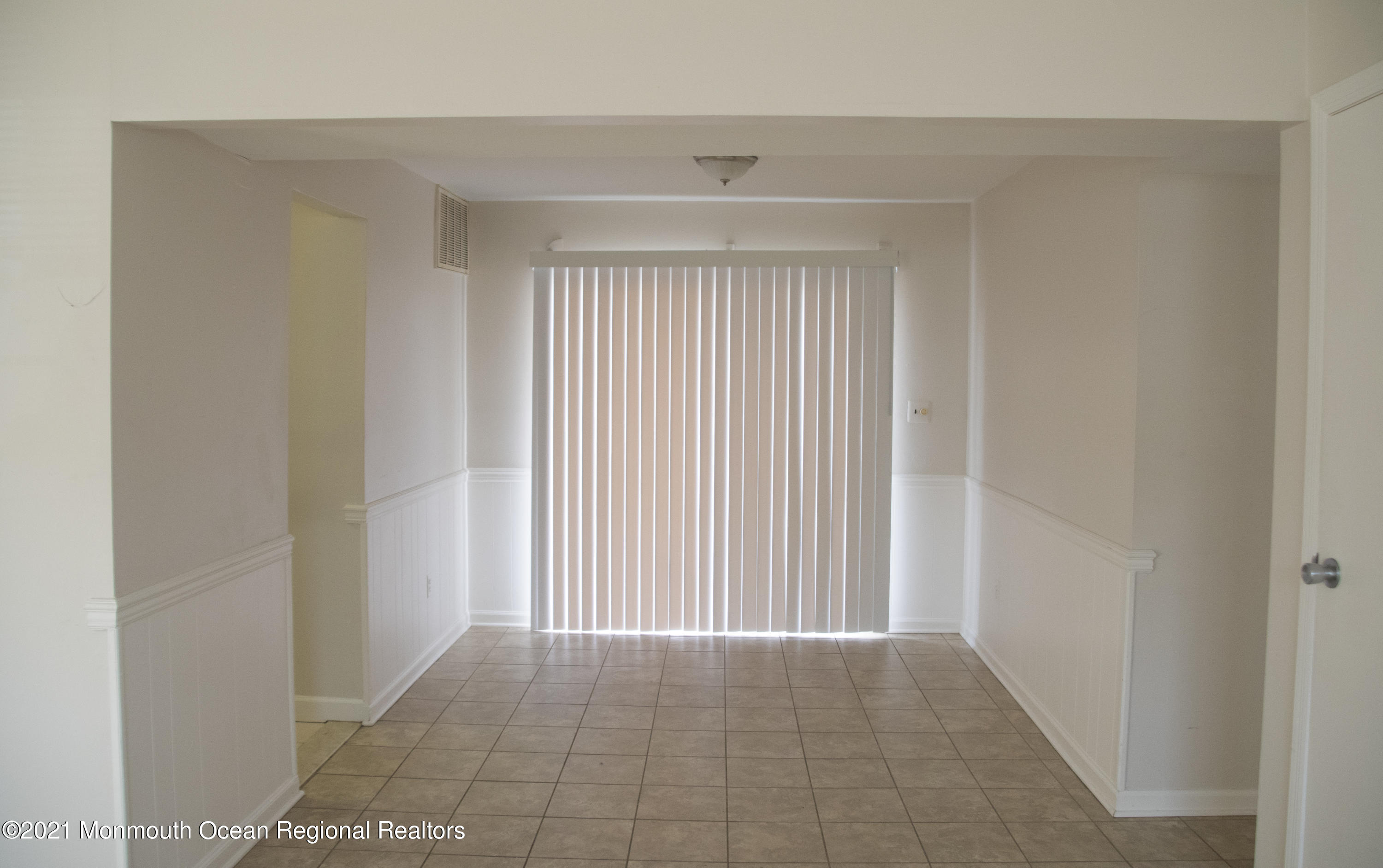 326 Sawmill Road, Unit 132 Brick, NJ 08724 - Photo 7 of 18 a view of an empty room and window