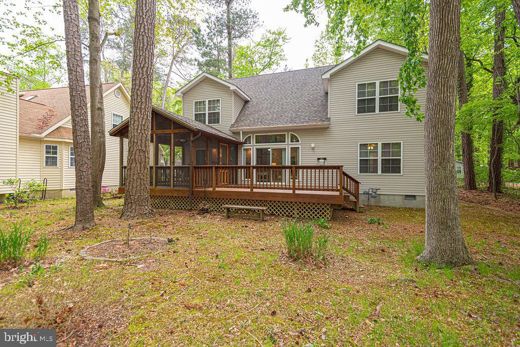 199 Windjammer Road Ocean Pines, MD 21811 - Photo 23 of 62 a front view of a house with a yard
