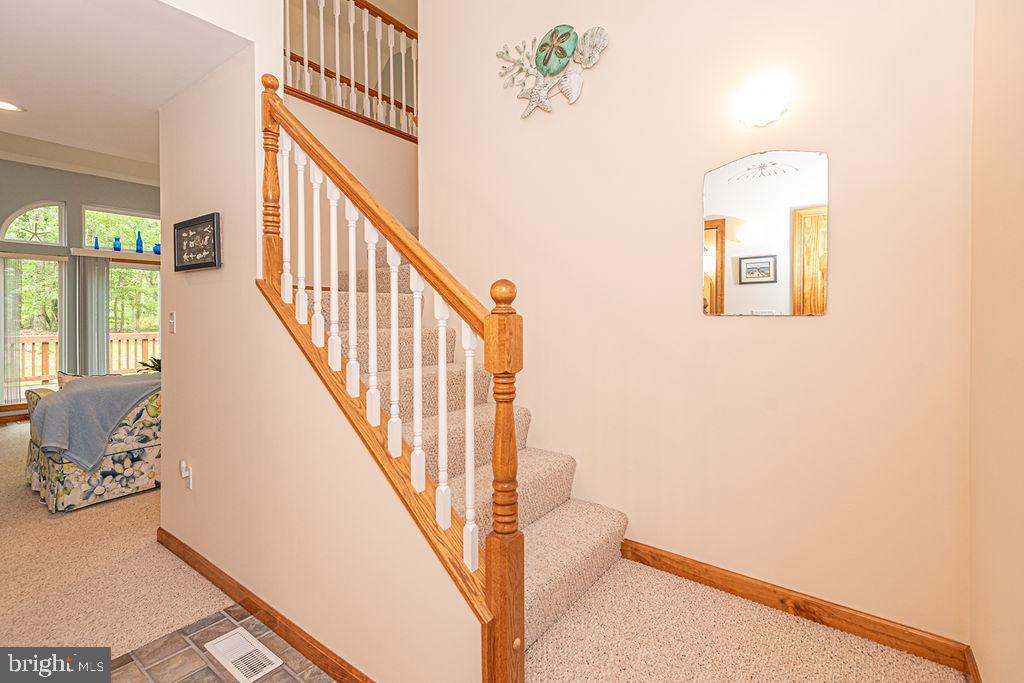 199 Windjammer Road Ocean Pines, MD 21811 - Photo 35 of 62 a view of a hallway with windows