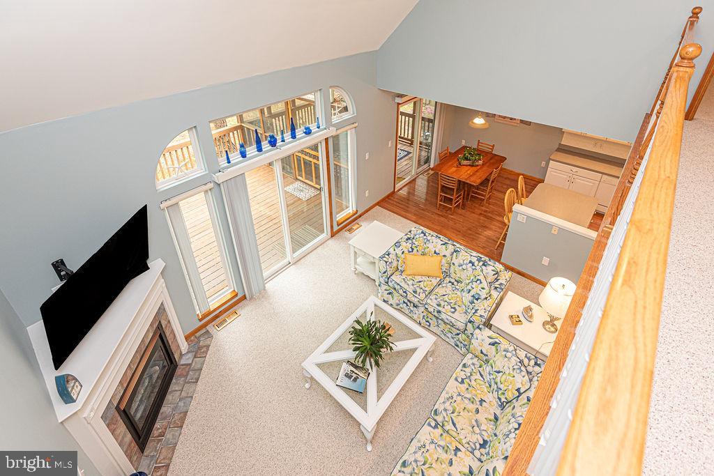 199 Windjammer Road Ocean Pines, MD 21811 - Photo 48 of 62 a view of a living room with furniture and a flat screen tv