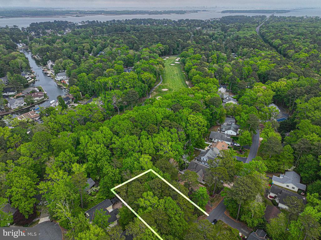 199 Windjammer Road Ocean Pines, MD 21811 - Photo 60 of 62 an aerial view of a house with a yard