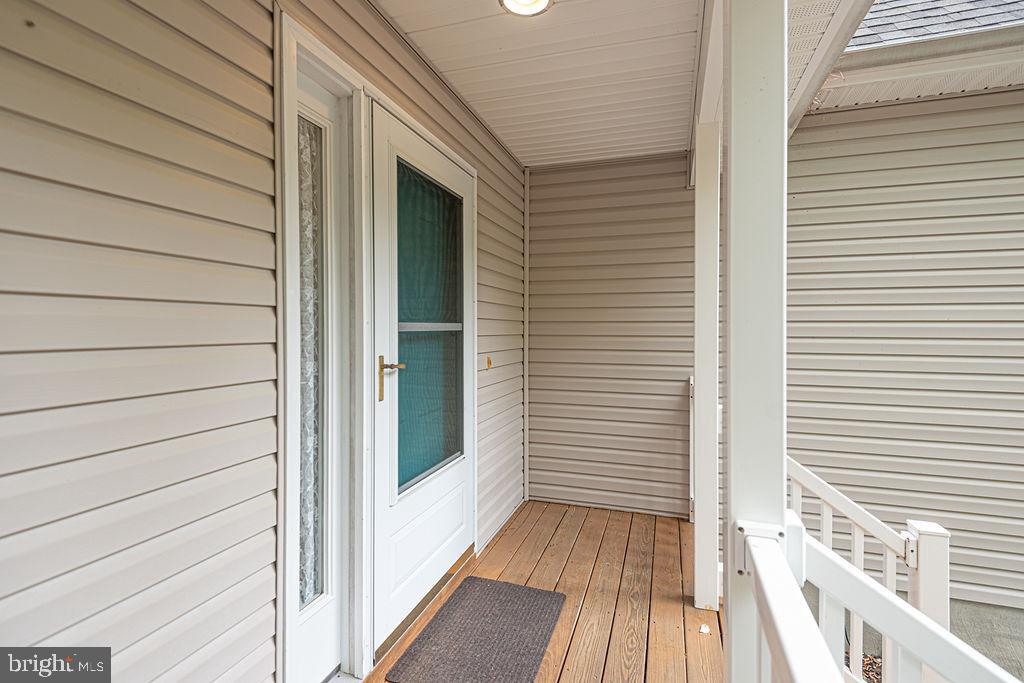 199 Windjammer Road Ocean Pines, MD 21811 - Photo 6 of 62 a view of a house with a door