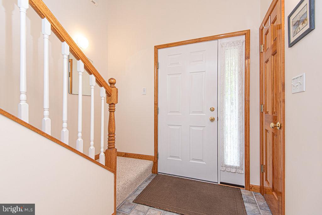 199 Windjammer Road Ocean Pines, MD 21811 - Photo 8 of 62 a view of a hallway with staircase