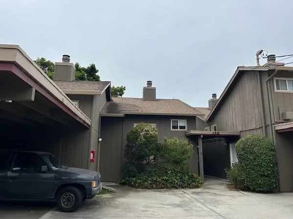 a car parked in front of a house