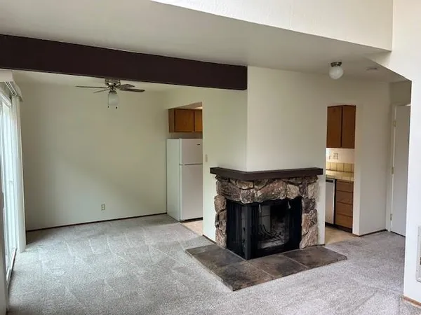 a living room with a fireplace in it