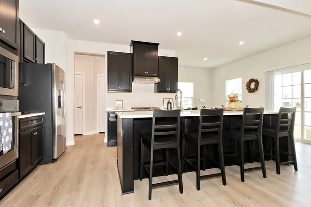a view of a dining room with furniture