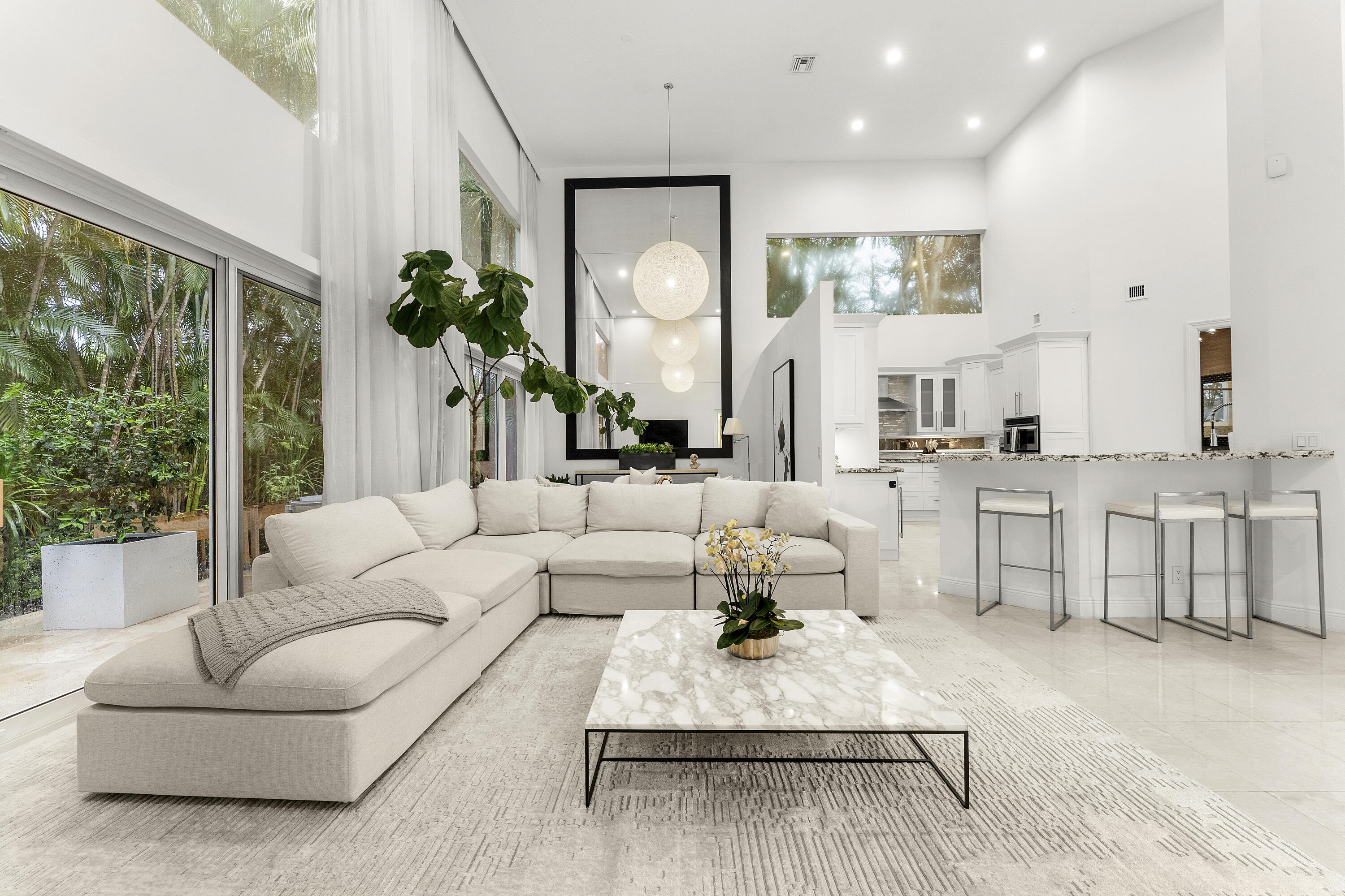 3156 Northwest 61st Street Boca Raton, FL 33496 - Photo 4 of 46 a living room with furniture and a large window