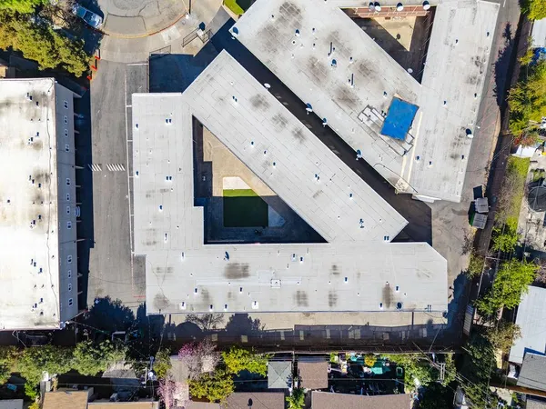 a view of an entryway with potted plants