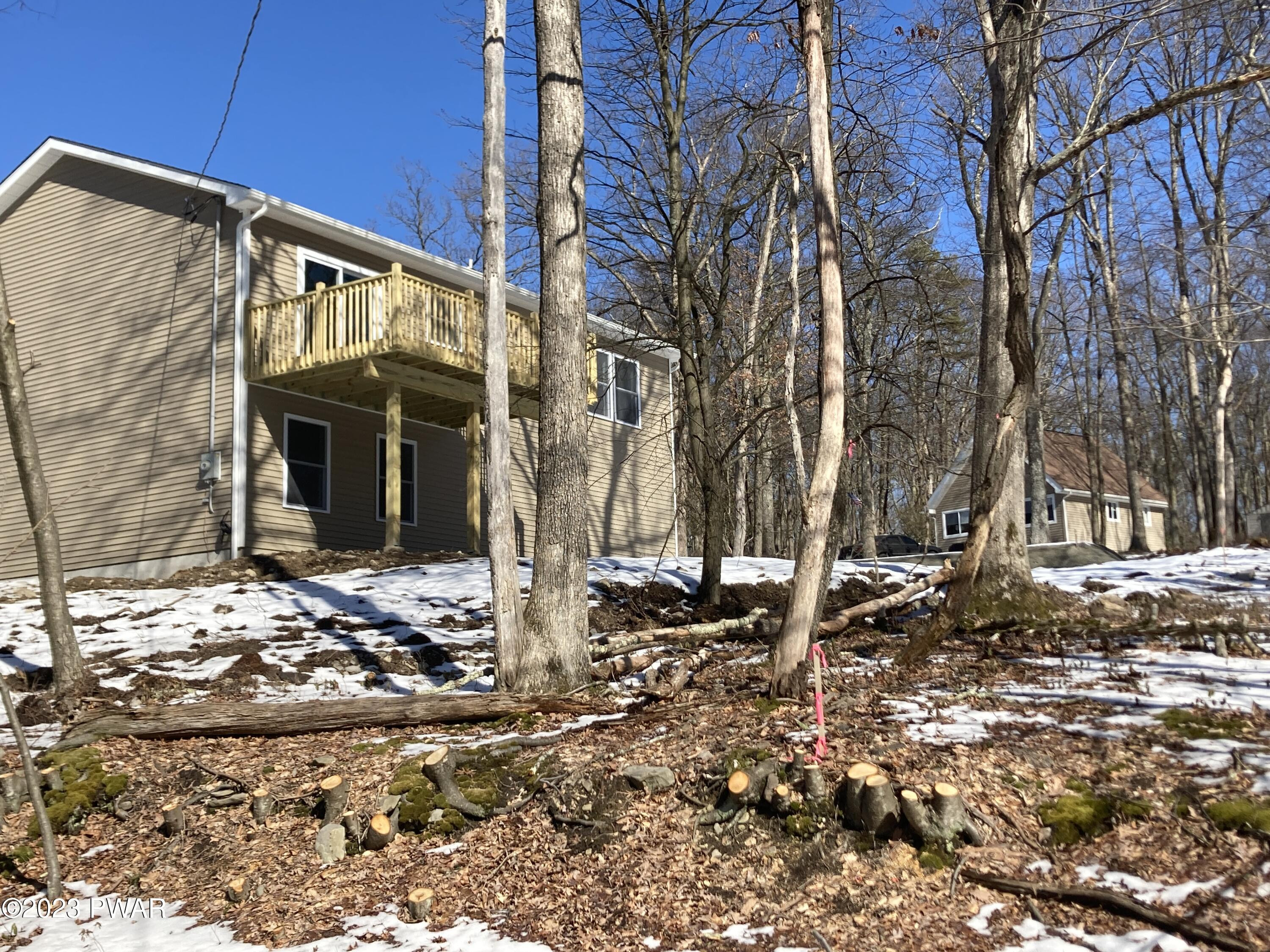 233 Ridge Drive Milford, PA 18337 - Photo 2 of 11 a backyard of a house with lots of green space