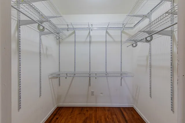 a view of a room with racks on the wall