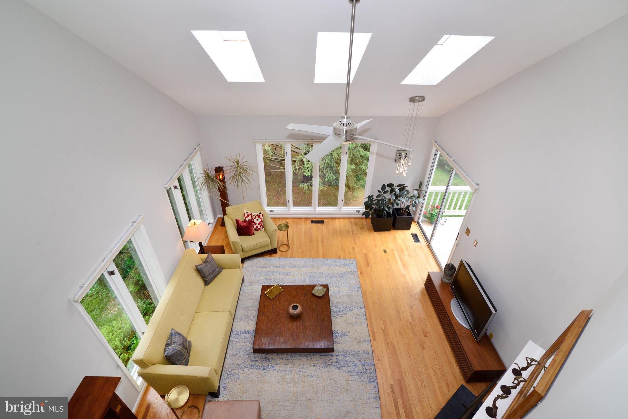 1301 Wedgewood Manor Way Reston, VA 20194 - Photo 33 of 55 View of living room from loft! loads of light!
