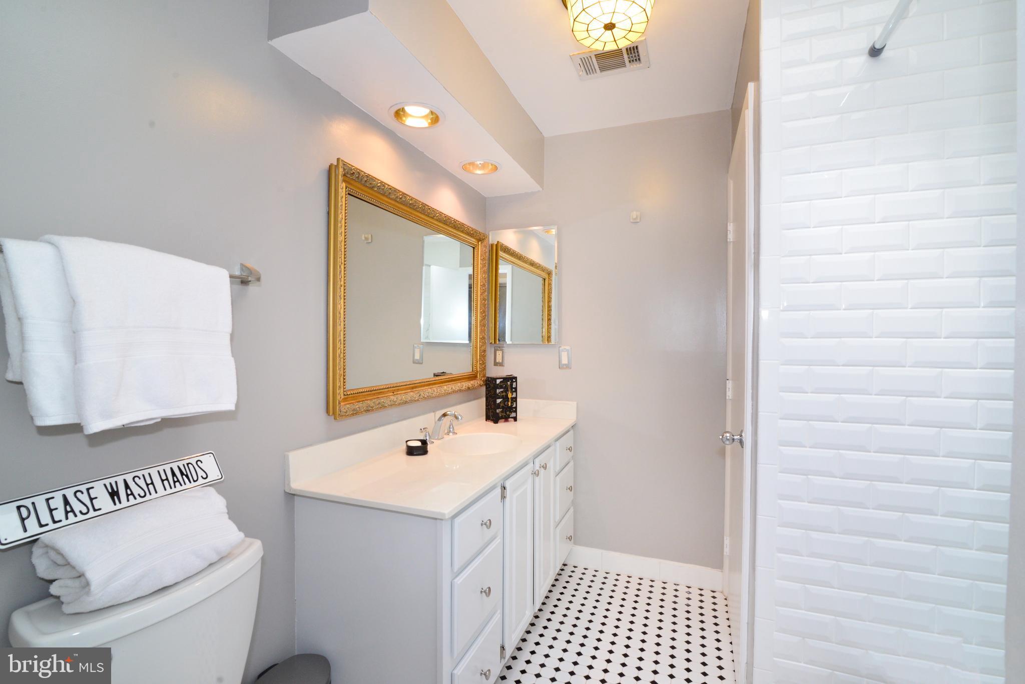 1301 Wedgewood Manor Way Reston, VA 20194 - Photo 34 of 55 Upper level bath with new tile floor and shower