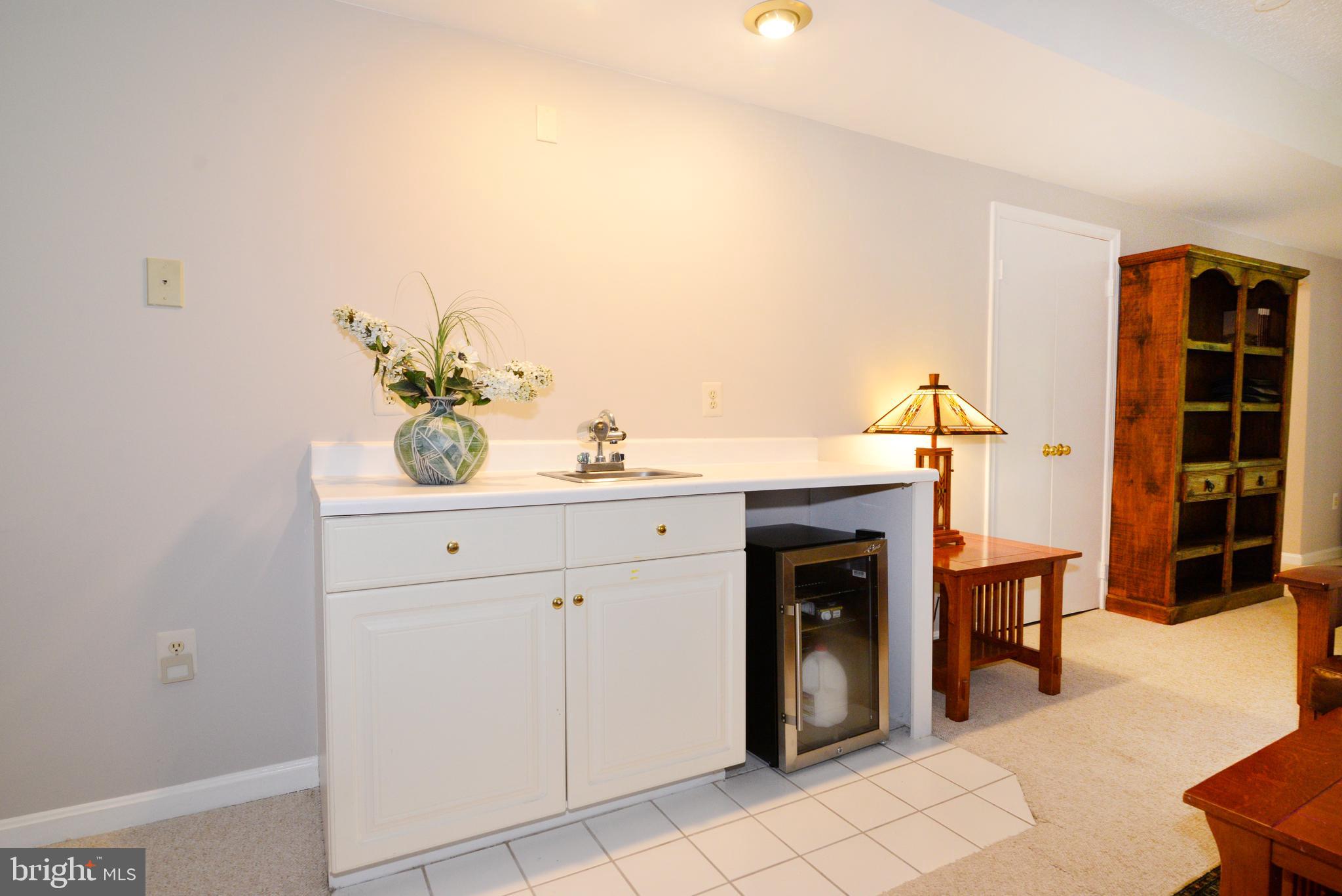 1301 Wedgewood Manor Way Reston, VA 20194 - Photo 41 of 55 Wet bar on lower level fam room