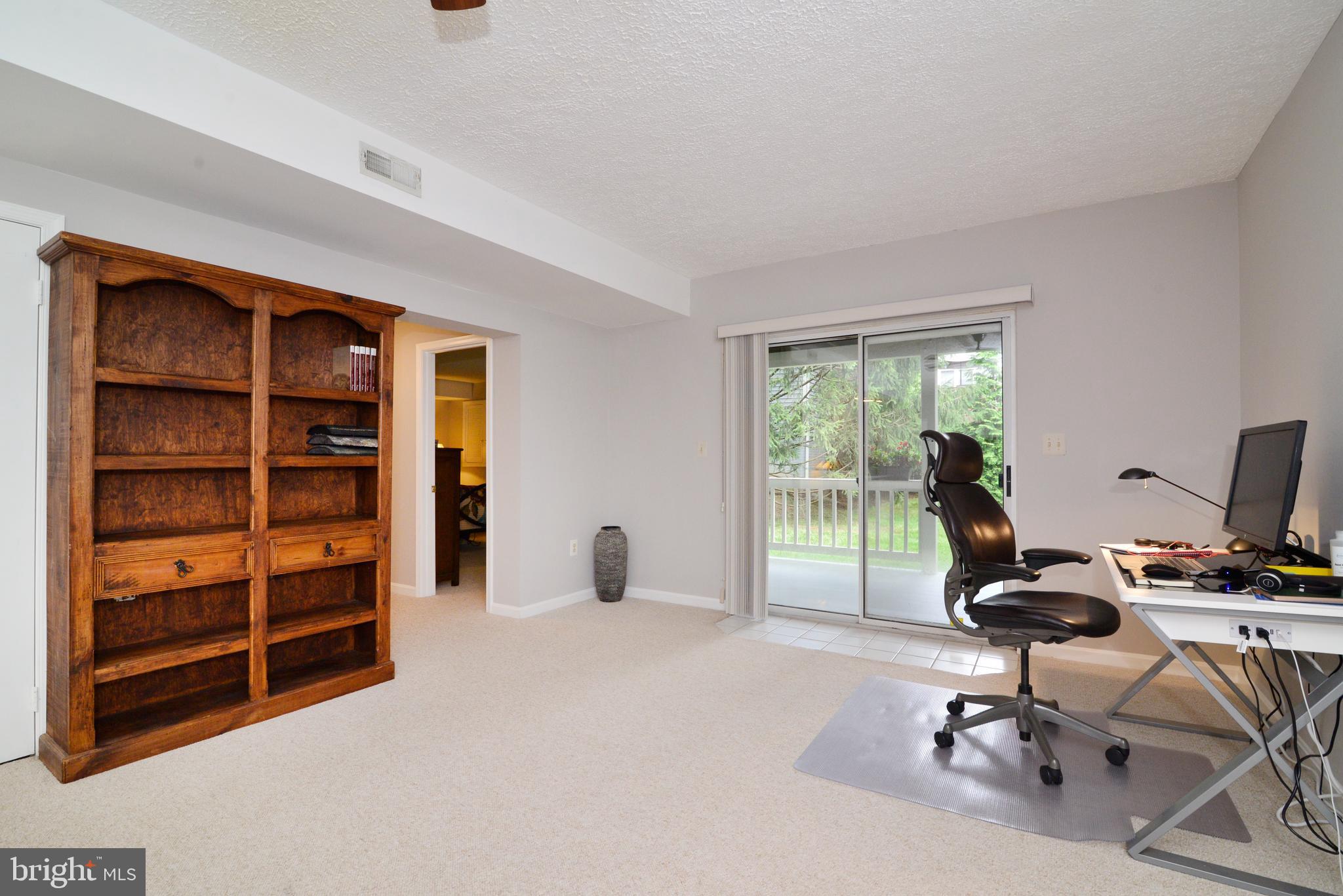 1301 Wedgewood Manor Way Reston, VA 20194 - Photo 43 of 55 Sliding doors open to deck on lower level