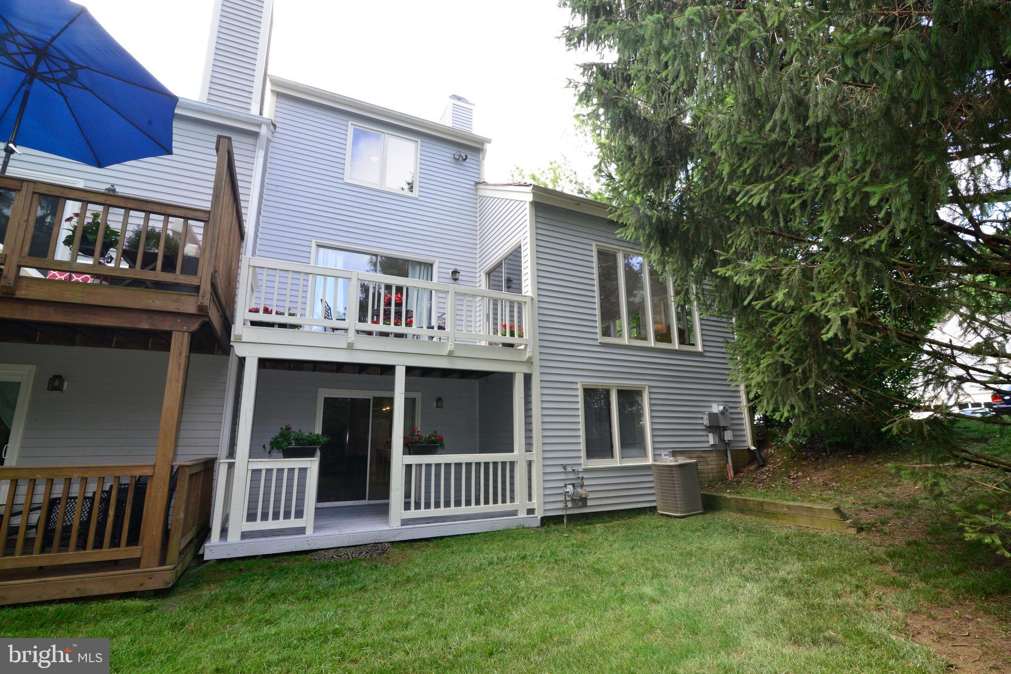 1301 Wedgewood Manor Way Reston, VA 20194 - Photo 52 of 55 Upper and lower level decks with treed views