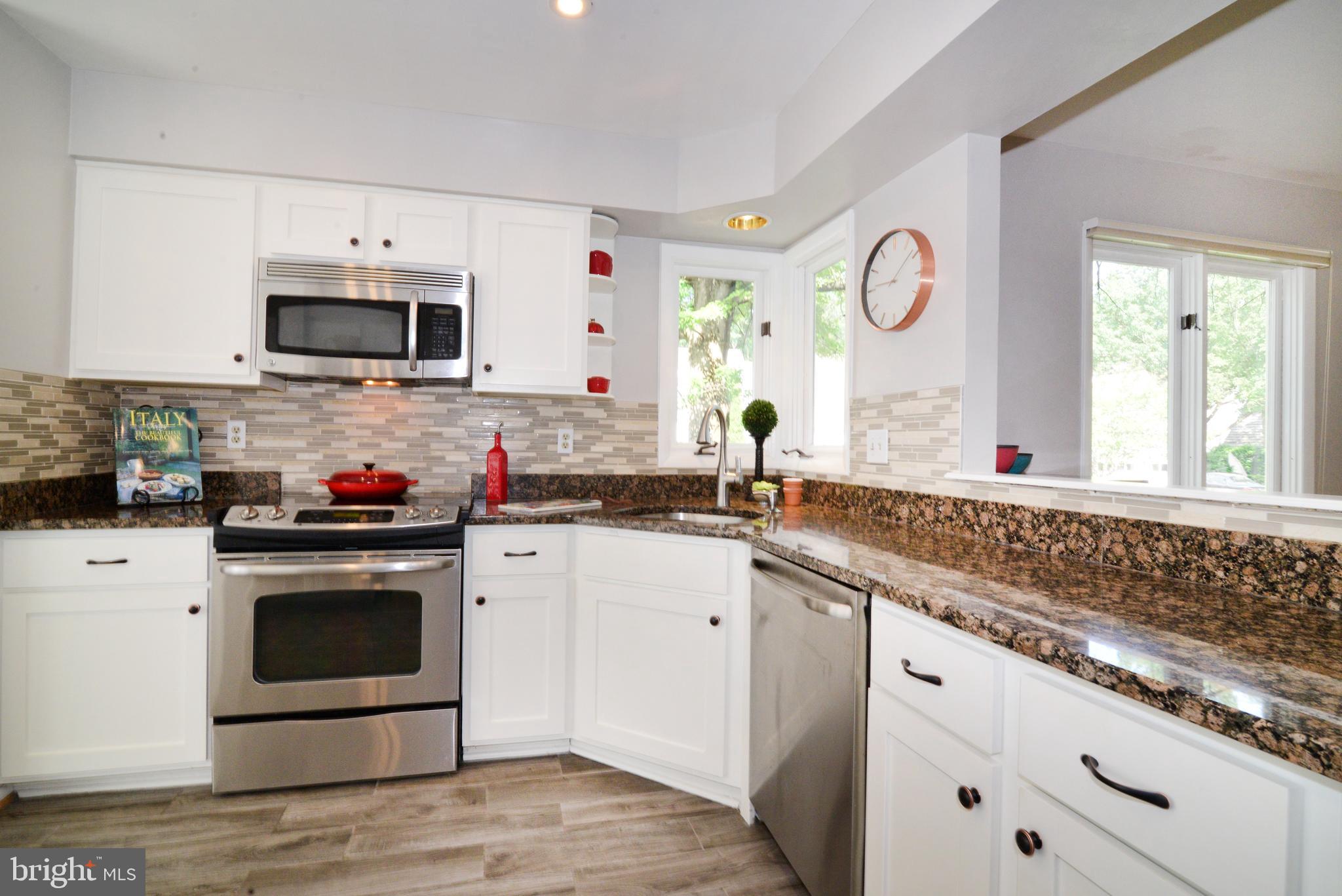 1301 Wedgewood Manor Way Reston, VA 20194 - Photo 10 of 55 Renovated kitchen, new cabinets and floor!