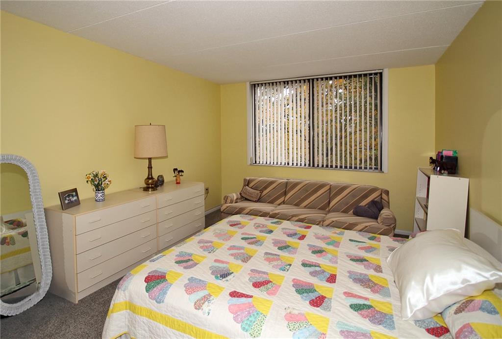 1160 Bower Hill Road, Unit 310A Pittsburgh, PA 15243 - Photo 24 of 46 a bedroom with a bed and a window